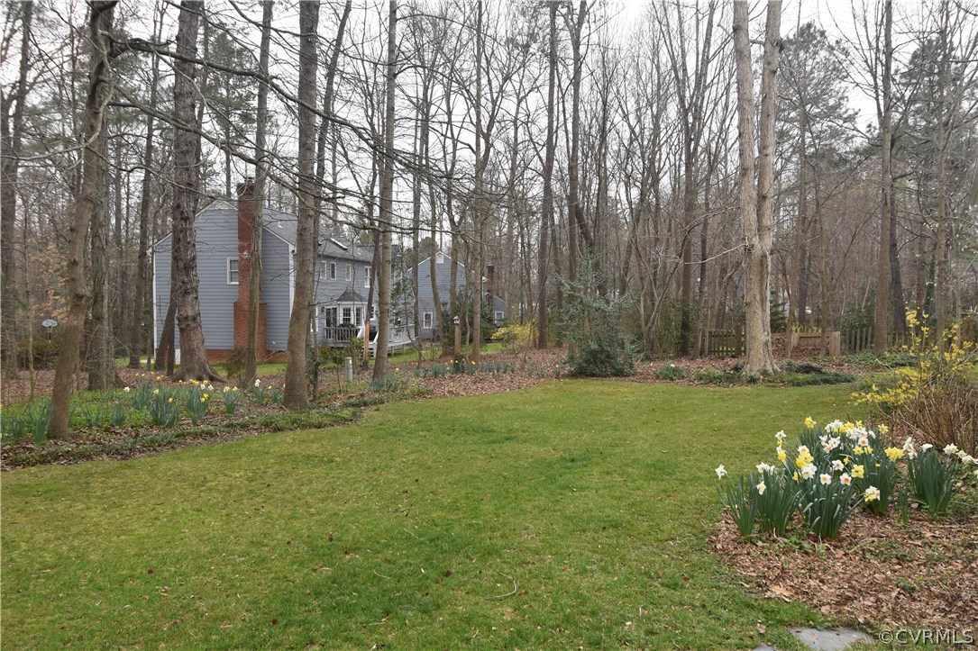 5705 North Chase Road Midlothian, VA 23112 - Photo 8 of 48 a row of trees and grass