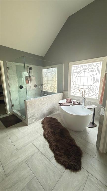 2966 Everson Ridge Court Southwest Snellville, GA 30039 - Photo 12 of 15 a bathroom with a tub sink and mirror