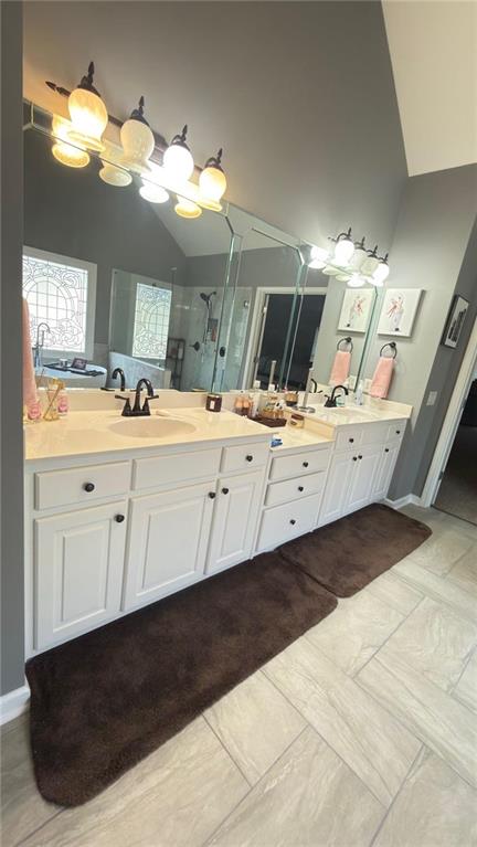 2966 Everson Ridge Court Southwest Snellville, GA 30039 - Photo 13 of 15 a view of a kitchen sink and dishwasher with wooden floor
