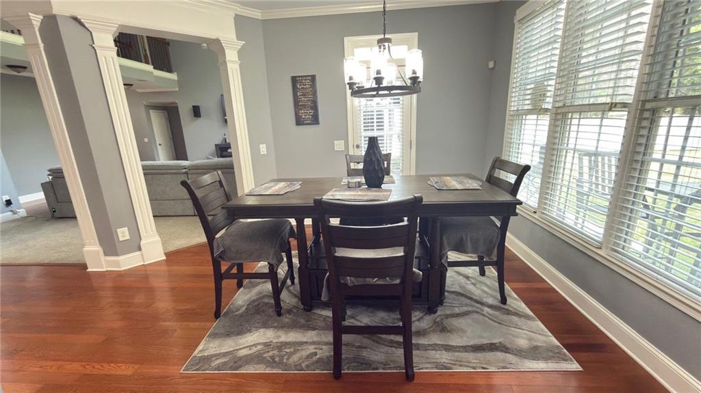2966 Everson Ridge Court Southwest Snellville, GA 30039 - Photo 4 of 15 a view of a dining room with furniture window and wooden floor