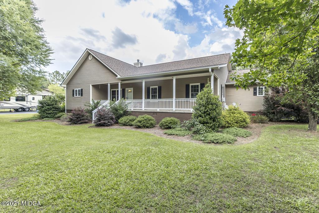 6246 Rogers Road Lizella, GA 31052 - Photo 5 of 48 a view of backyard of house with green space