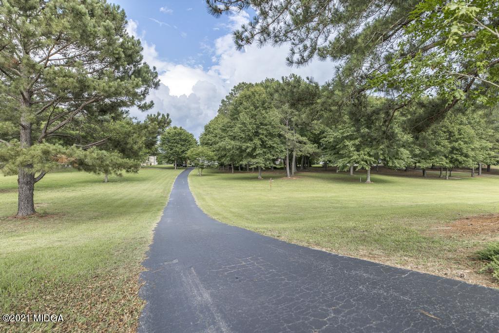6246 Rogers Road Lizella, GA 31052 - Photo 48 of 48 a view of a yard with a tree