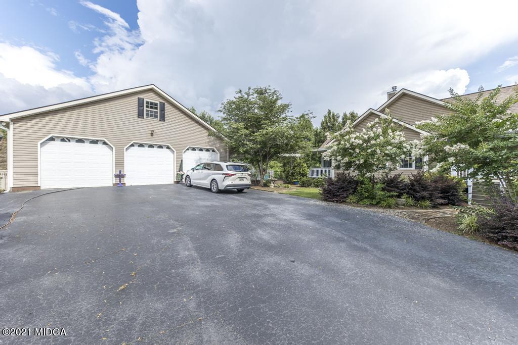 6246 Rogers Road Lizella, GA 31052 - Photo 6 of 48 a view of a car garage