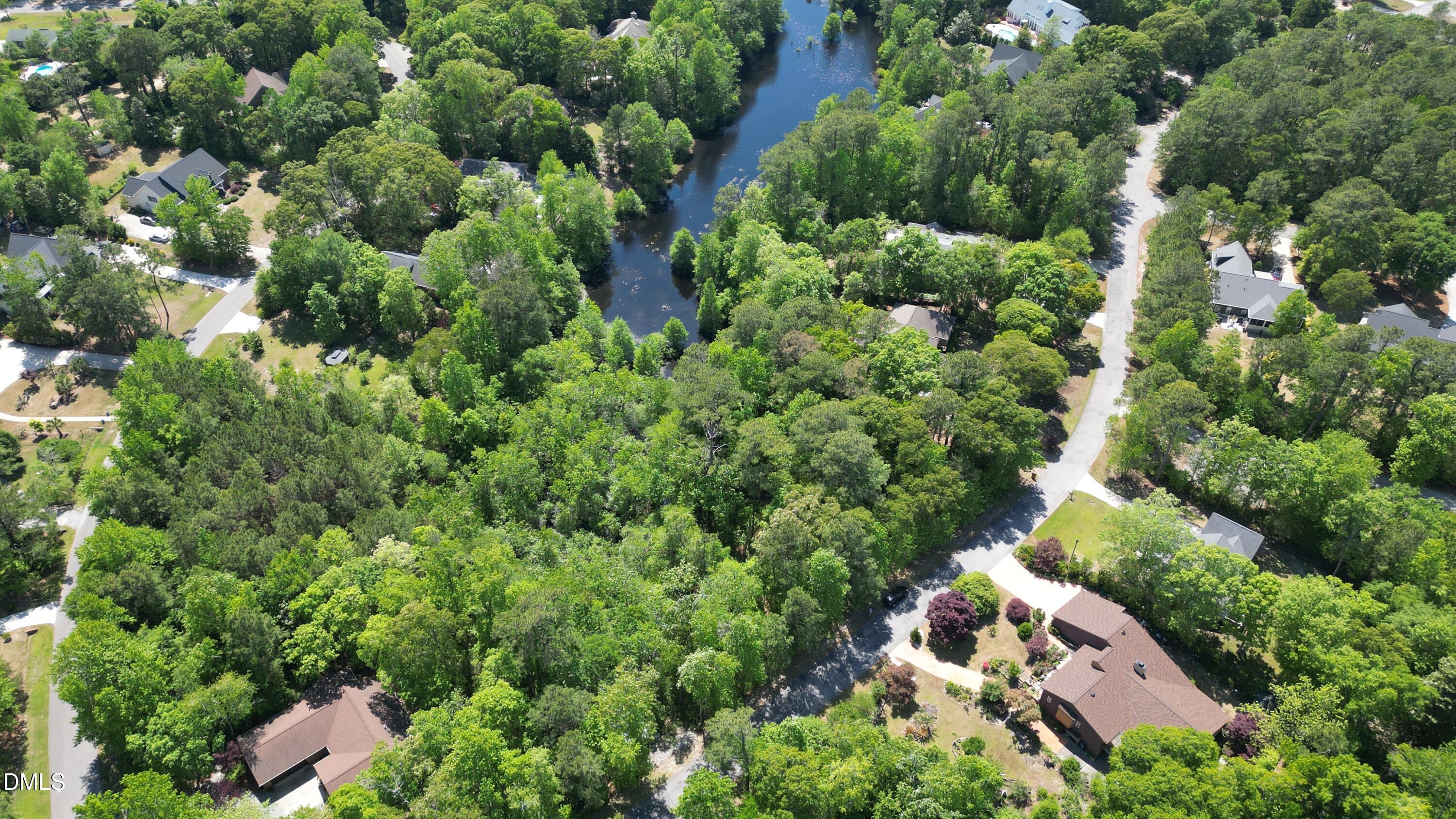 Lot A Coots Trail Hampstead, NC 28443 - Photo 5 of 10 an aerial view of residential house with outdoor space and trees all around