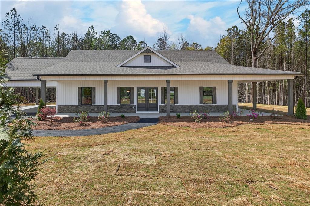 3512 Vinson Mountain Road Rockmart, GA 30153 - Photo 3 of 49 a view of a house with swimming pool and porch with furniture