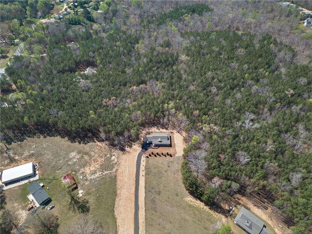 3512 Vinson Mountain Road Rockmart, GA 30153 - Photo 45 of 49 an aerial view of a house with a yard