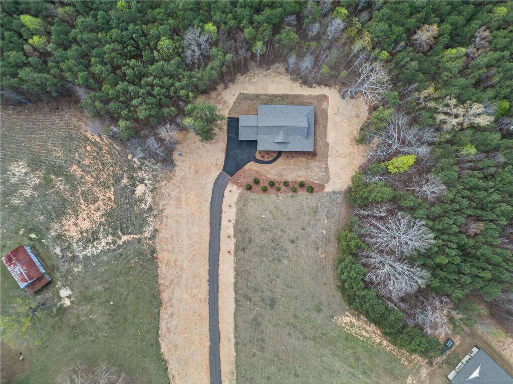 3512 Vinson Mountain Road Rockmart, GA 30153 - Photo 46 of 49 a front view of a house with a yard