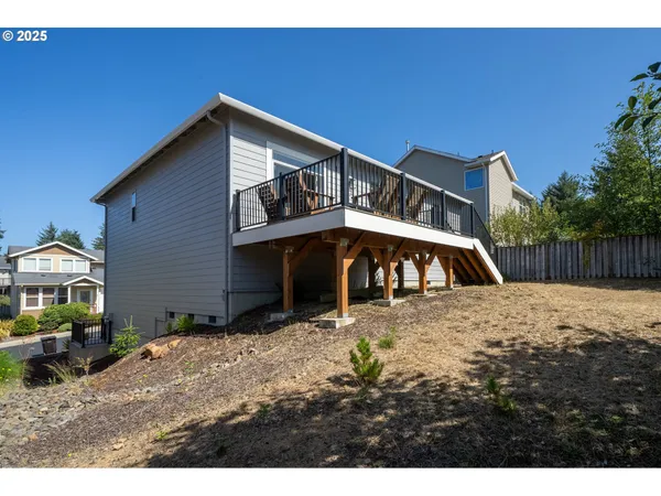 a aerial view of a house with swimming pool and sitting area