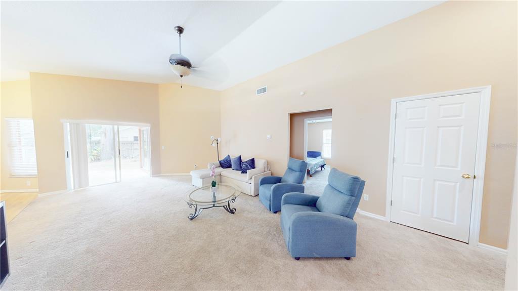 1103 Mallory Point Drive Valrico, FL 33596 - Photo 12 of 21 a living room with furniture and a window