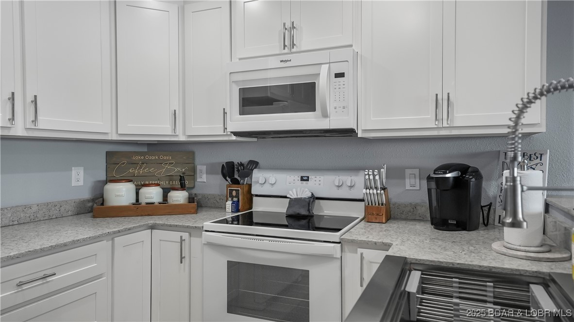 1481 Ledges Drive, Unit 1019 Osage Beach, MO 65065 - Photo 12 of 52 Modern design with panoramic lakefront glass slide