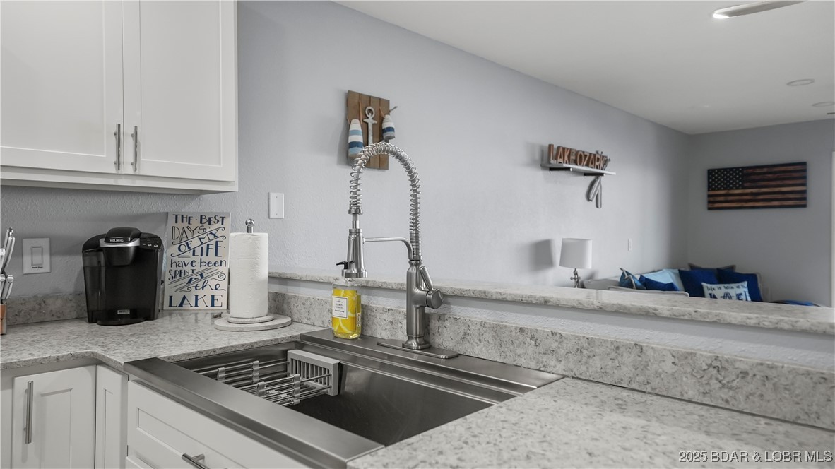 1481 Ledges Drive, Unit 1019 Osage Beach, MO 65065 - Photo 13 of 52 Modern design with panoramic lakefront glass slide