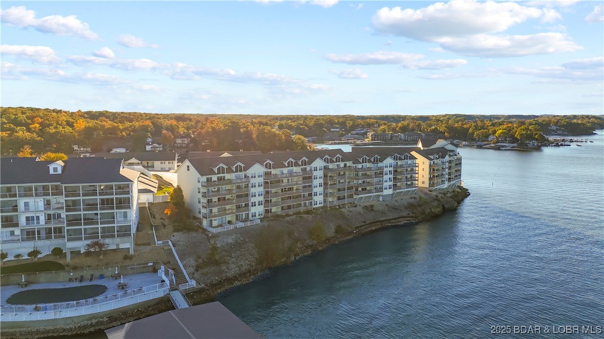 1481 Ledges Drive, Unit 1019 Osage Beach, MO 65065 - Photo 38 of 52 Lakeside walking paths and manicured green space