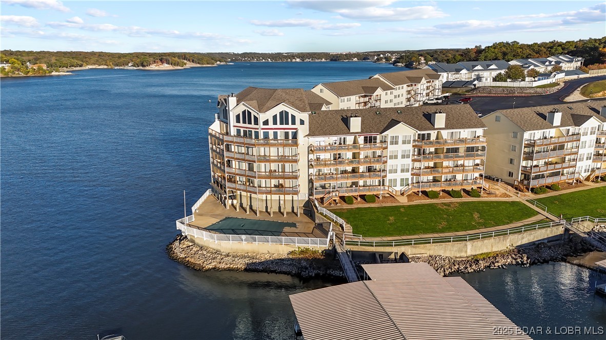 1481 Ledges Drive, Unit 1019 Osage Beach, MO 65065 - Photo 39 of 52 Lakeside walking paths and manicured green space