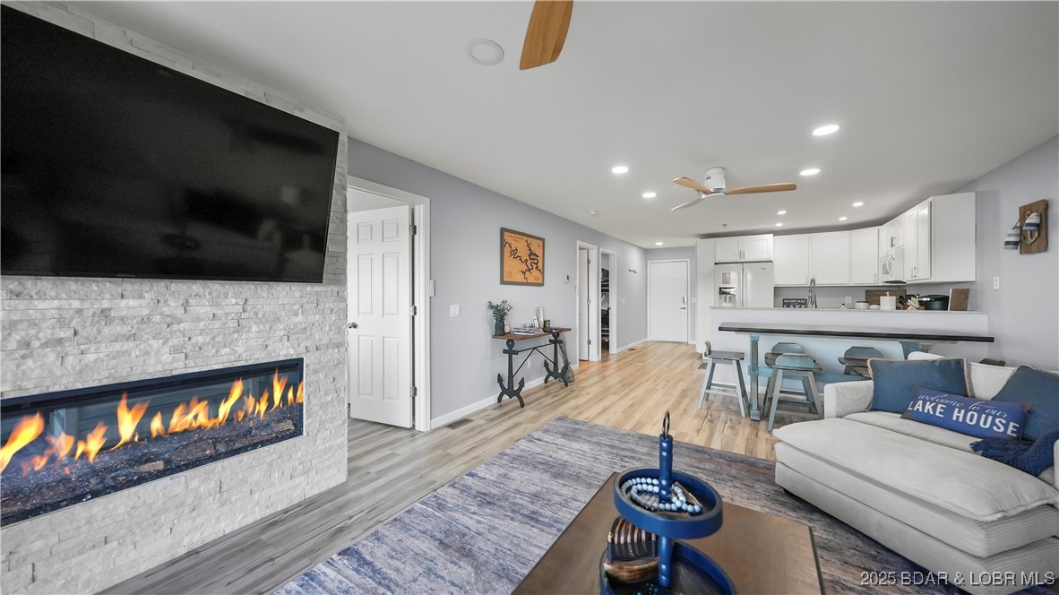 1481 Ledges Drive, Unit 1019 Osage Beach, MO 65065 - Photo 6 of 52 Modern design with panoramic lakefront glass slide