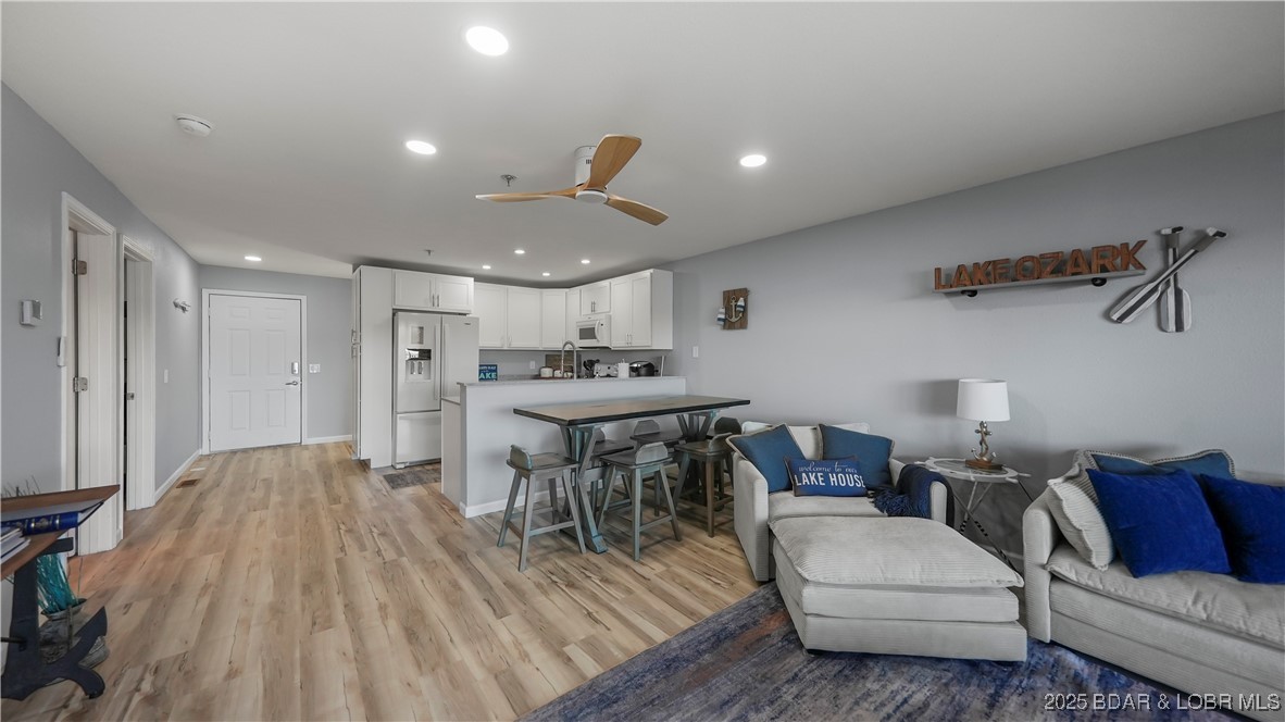 1481 Ledges Drive, Unit 1019 Osage Beach, MO 65065 - Photo 7 of 52 Modern design with panoramic lakefront glass slide