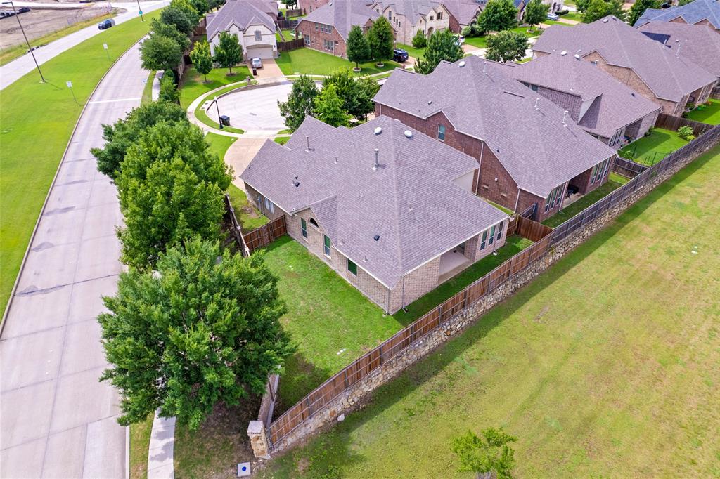 600 Fishback Circle Plano, TX 75074 - Photo 20 of 38 an aerial view of a house with a garden