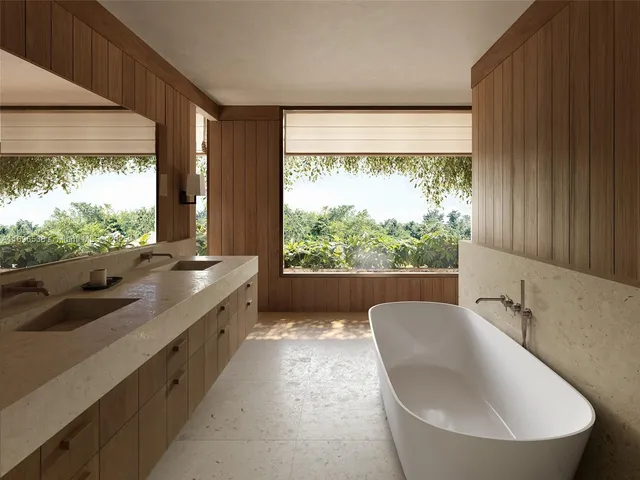 a bathroom with a sink and a large window