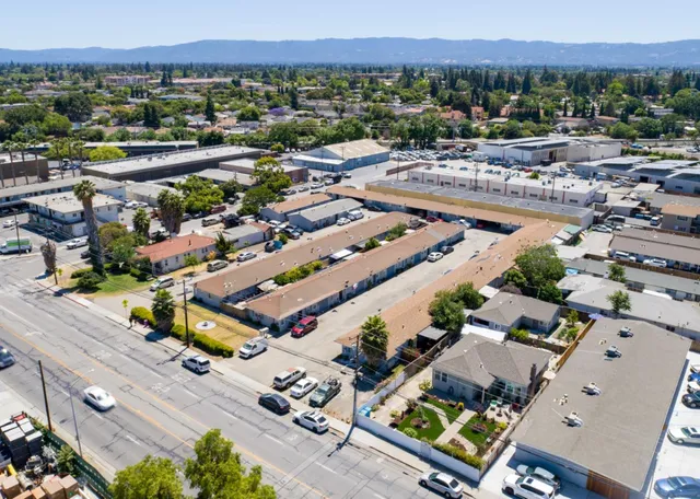 an aerial view of residential house with outdoor space