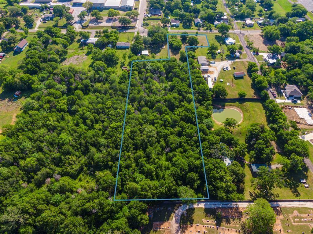 0 North Barron Street Covington, TX 76636 - Photo 11 of 14 an aerial view of residential house with outdoor space and swimming pool
