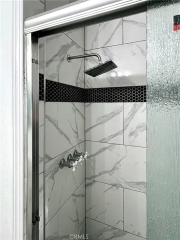 a view of a house with swimming pool and sitting area