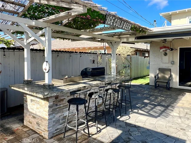 a bathroom with a shower and a plant