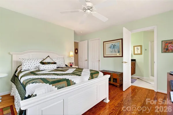 a view of a bedroom with washer and dryer