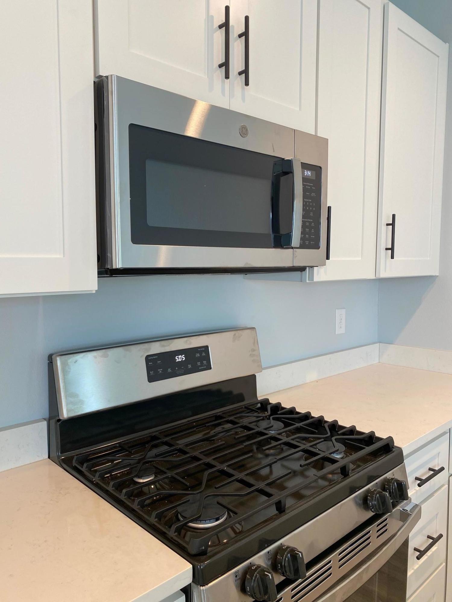 Lot #16 Lighthouse Pointe Boulevard Santa Rosa Beach, FL 32459 - Photo 7 of 23 a stove top oven sitting inside of a kitchen