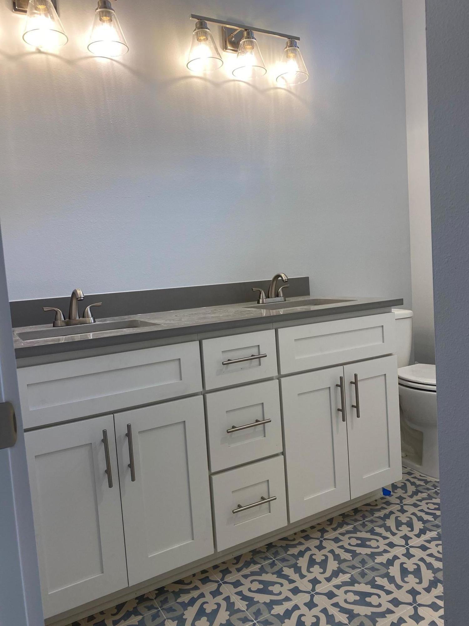 Lot #16 Lighthouse Pointe Boulevard Santa Rosa Beach, FL 32459 - Photo 8 of 23 a utility room with cabinets