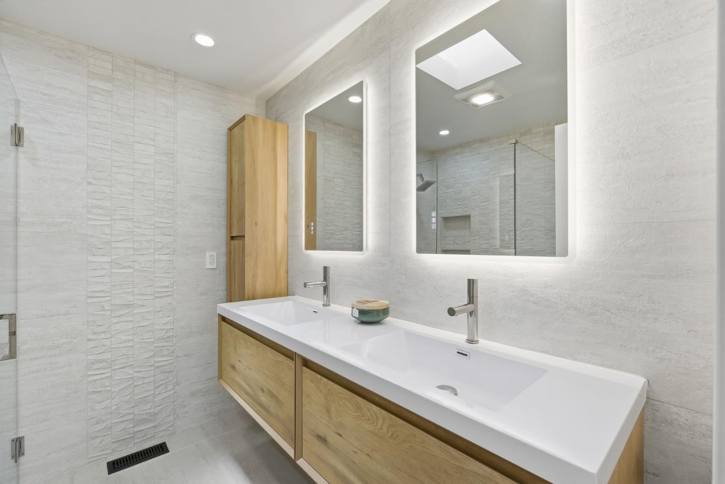 845 Pollard Road Los Gatos, CA 95032 - Photo 25 of 47 a bathroom with a sink and a mirror
