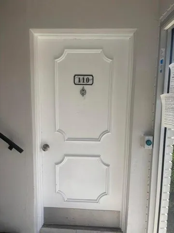 a bathroom with a shower and a toilet