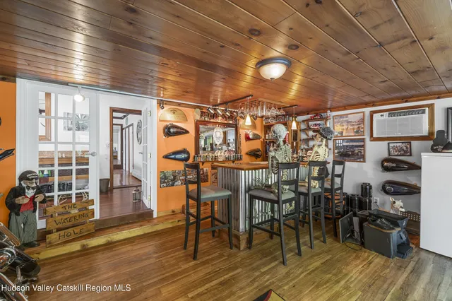 a view of a chairs and table in a room