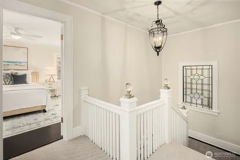 a view of a hallway with windows