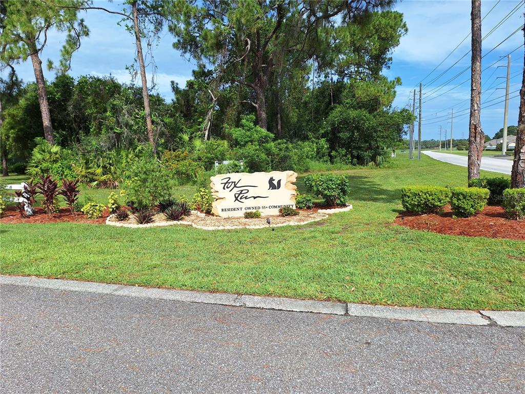 432 Santa Fe Road Tavares, FL 32778 - Photo 31 of 41 a view of a park with a bench and trees