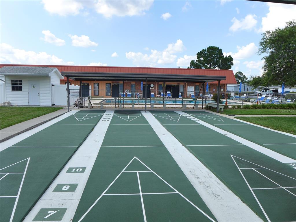 432 Santa Fe Road Tavares, FL 32778 - Photo 35 of 41 a front view of a house with a yard