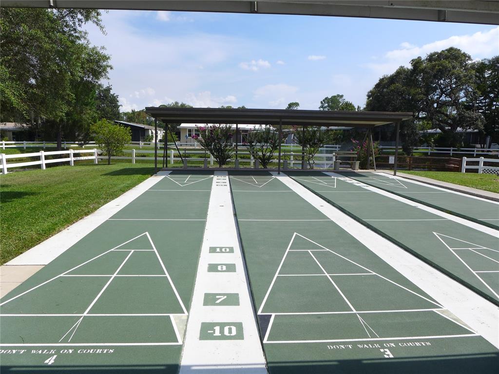 432 Santa Fe Road Tavares, FL 32778 - Photo 36 of 41 a view of a tennis court