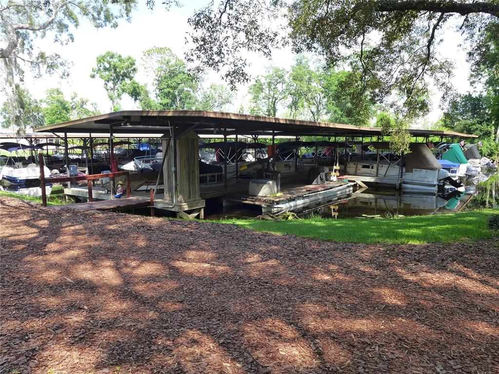 432 Santa Fe Road Tavares, FL 32778 - Photo 40 of 41 a view of outdoor space yard and patio