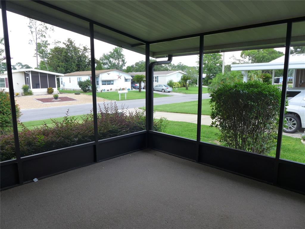 432 Santa Fe Road Tavares, FL 32778 - Photo 7 of 41 a view of a city street from a window