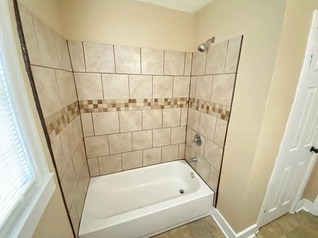 a bathroom with a bathtub