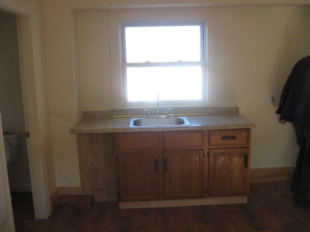 607 South Main Street Fall River, MA 02721 - Photo 13 of 24 a bathroom with a sink and a vanity