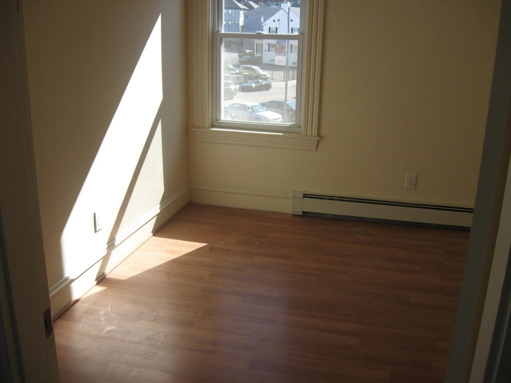 607 South Main Street Fall River, MA 02721 - Photo 18 of 24 a view of an empty room and window