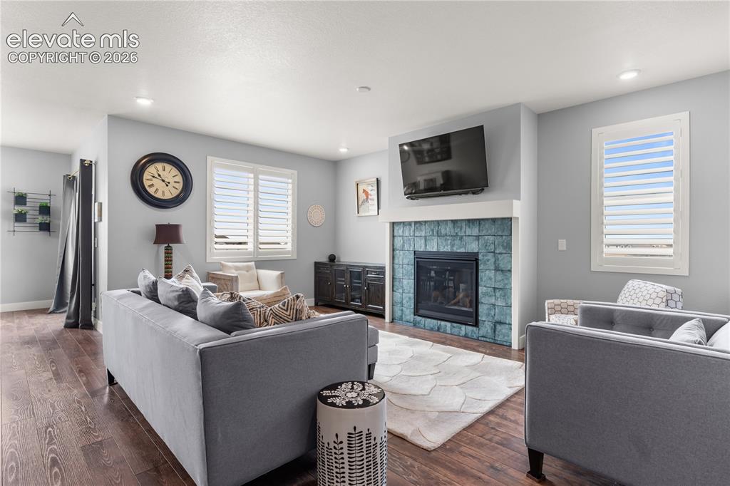 12781 Granite Ridge Drive Peyton, CO 80831 - Photo 6 of 41 Stunning hardwood floors throughout this home.
