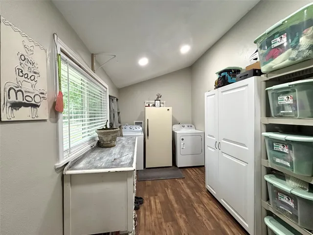 a white refrigerator freezer sitting inside of a kitchen