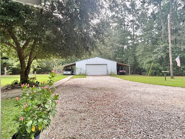 a house with trees in front of it