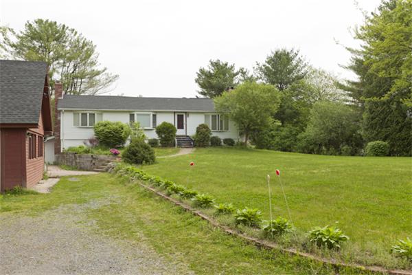 57 Concord Road Wayland, MA 01778 - Photo 1 of 10 a view of a house with a garden