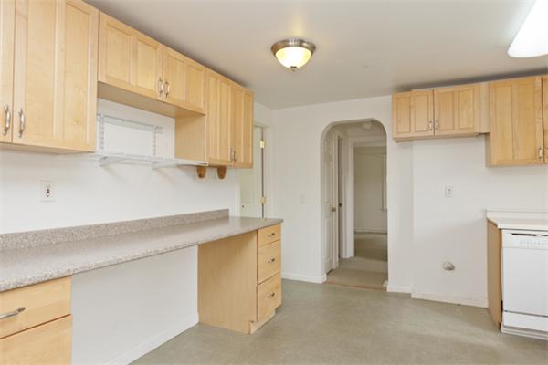 57 Concord Road Wayland, MA 01778 - Photo 2 of 10 a view of a kitchen with electric appliances