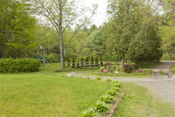 57 Concord Road Wayland, MA 01778 - Photo 10 of 10 a view of a field with large trees
