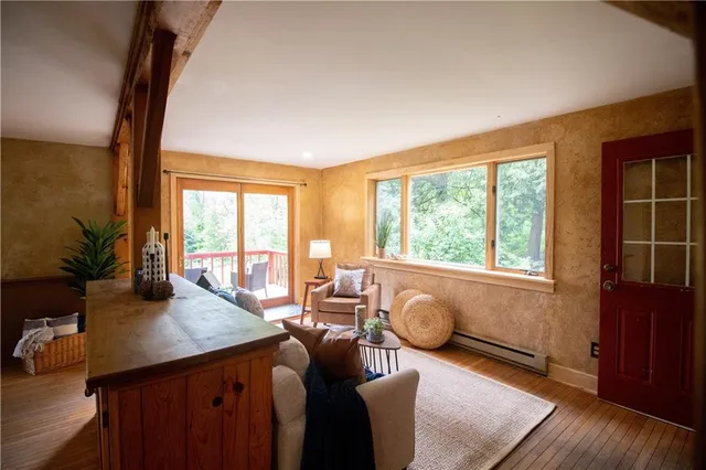 a living room with furniture and a window