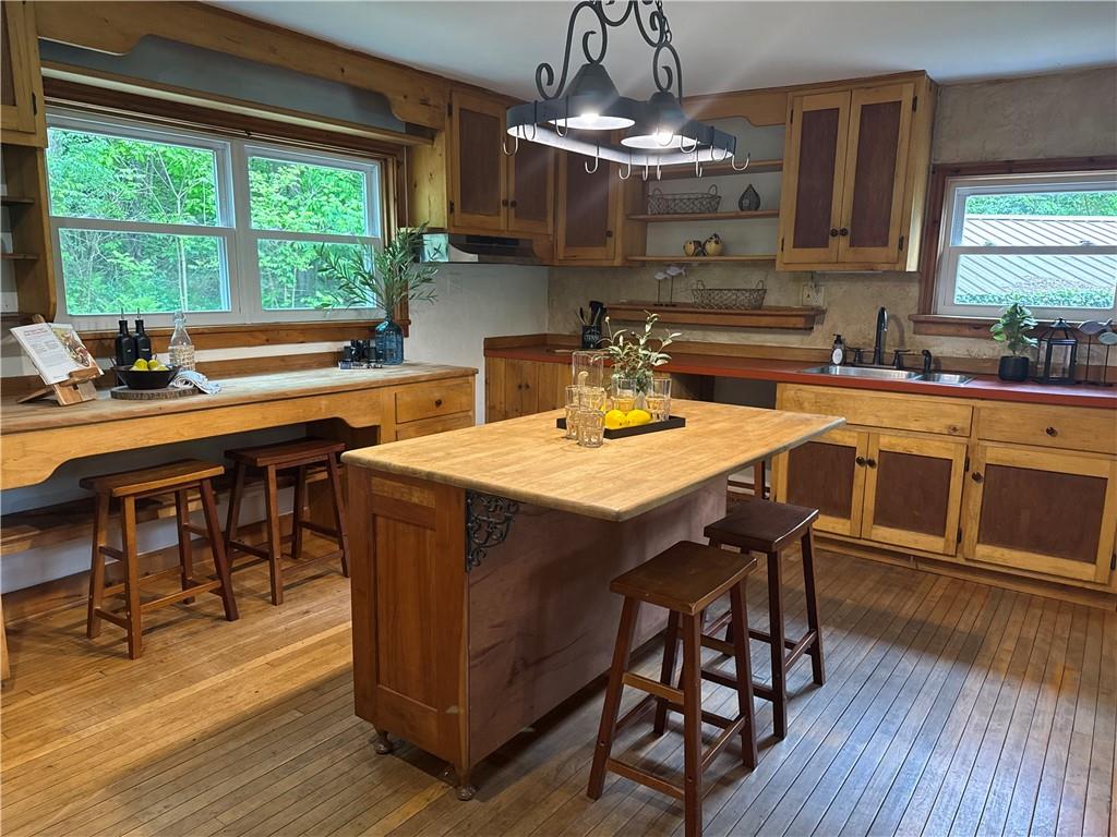 55 Elm St Extension Stoneboro, PA 16153 - Photo 27 of 44 a view of a dining room with furniture window and outside view