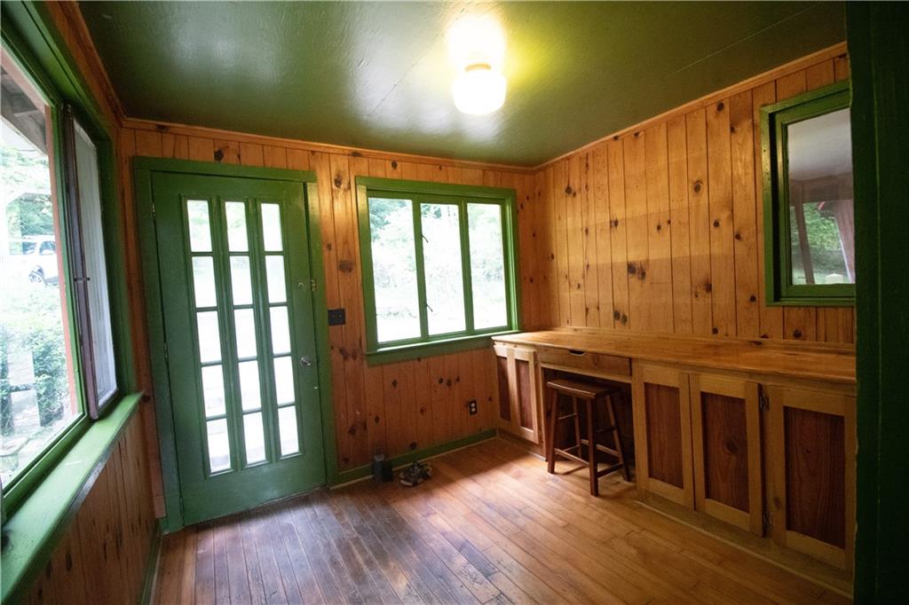 55 Elm St Extension Stoneboro, PA 16153 - Photo 31 of 44 a view of a large entrance with wooden floor and windows