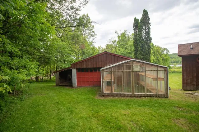 a view of a back yard of the house